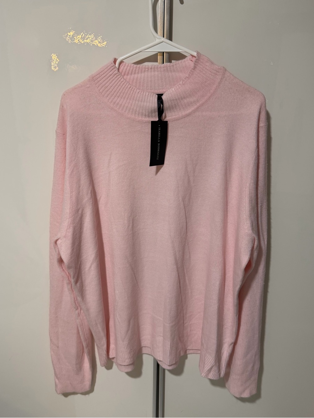 Isabella Rodriguez Pink Ribbed Mock Neck Sweater